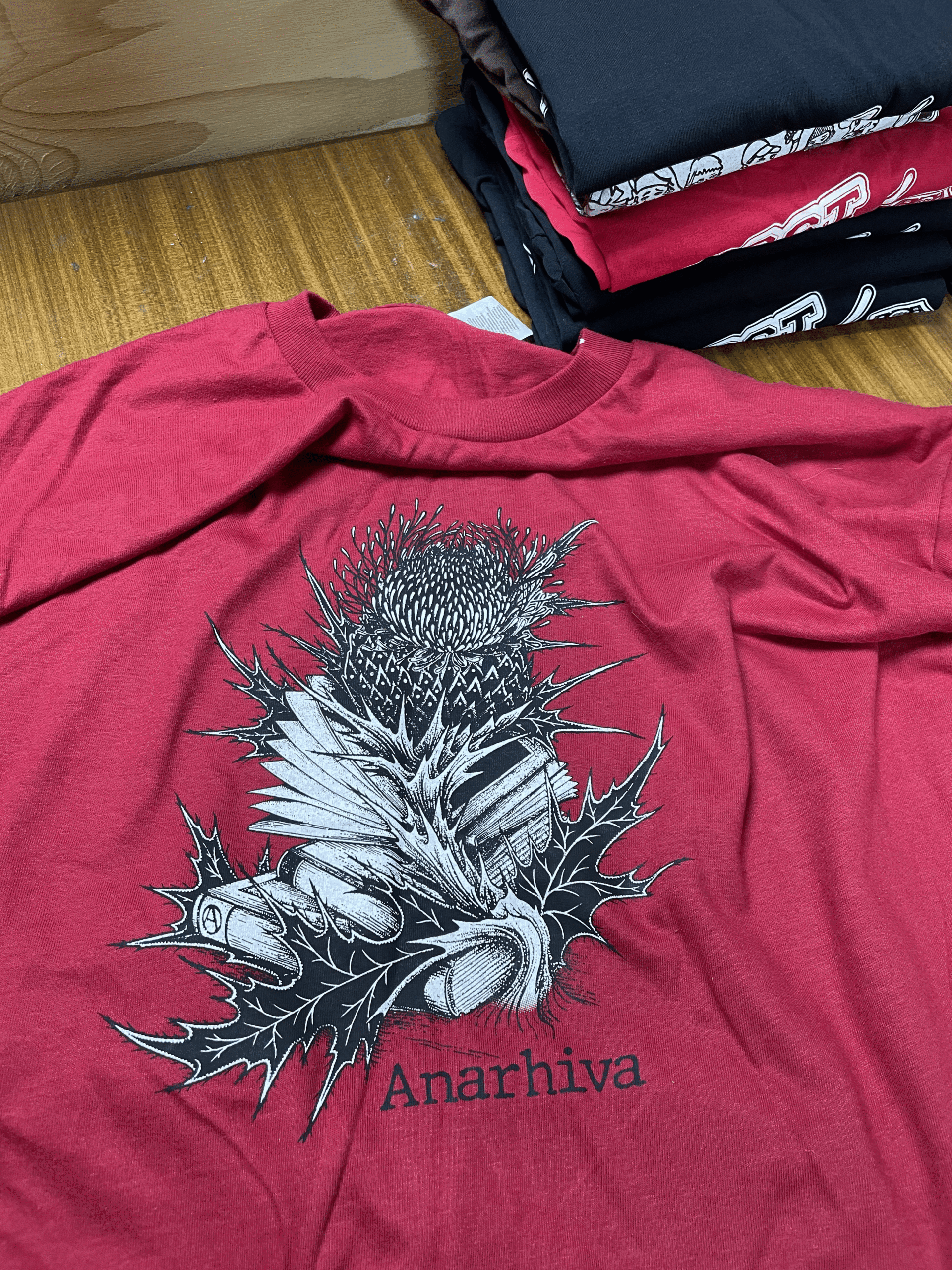 red t-shirt with the text: anarchiva